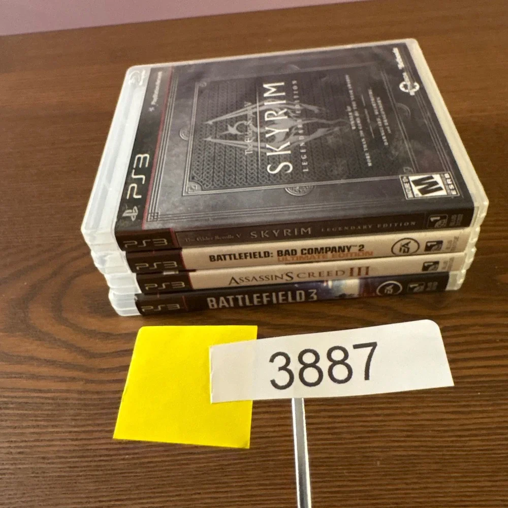 Sony PS3 Video Game Lot 4 Skyrim Battlefield 3 Bad Company 2 Assassins Creed III
